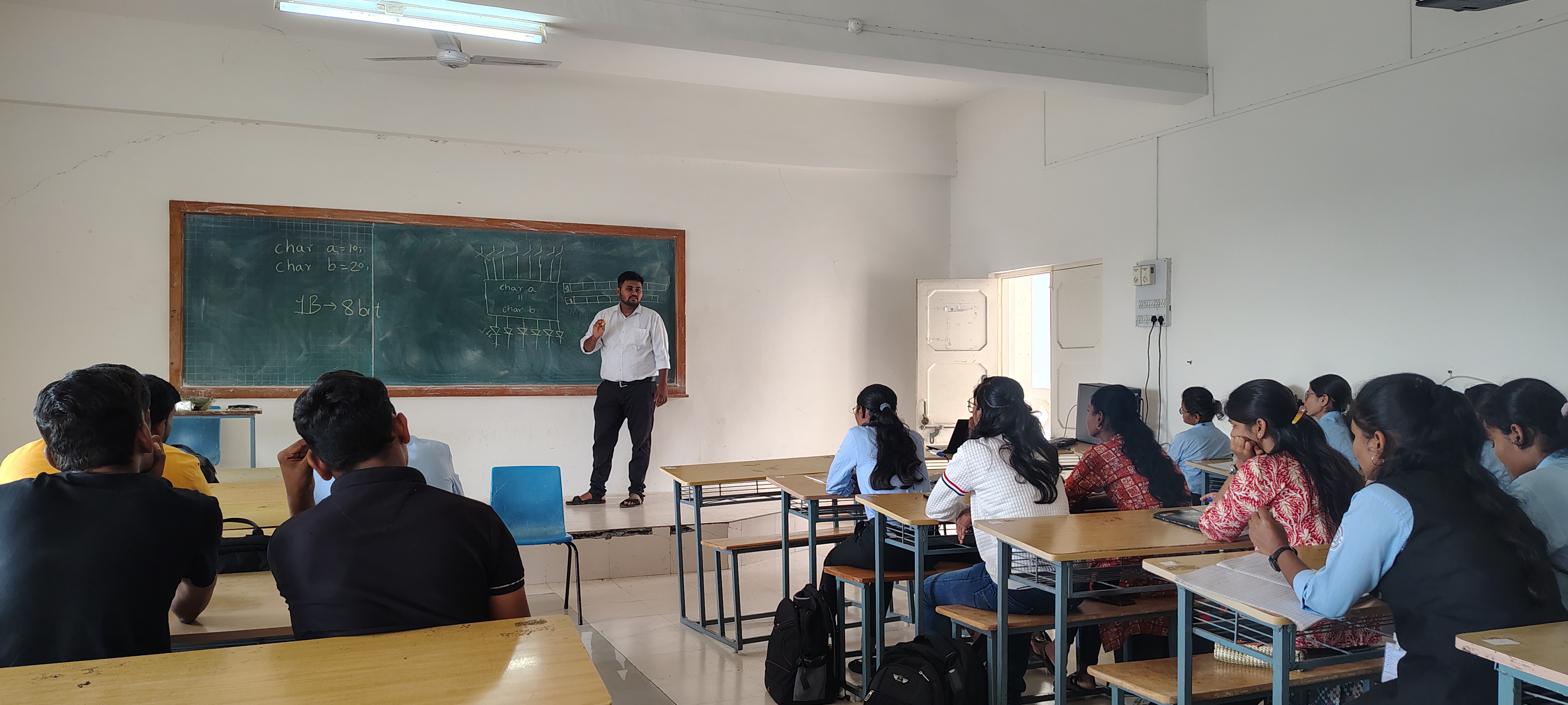 Engineering students attending an embedded systems lecture and practical demonstration
