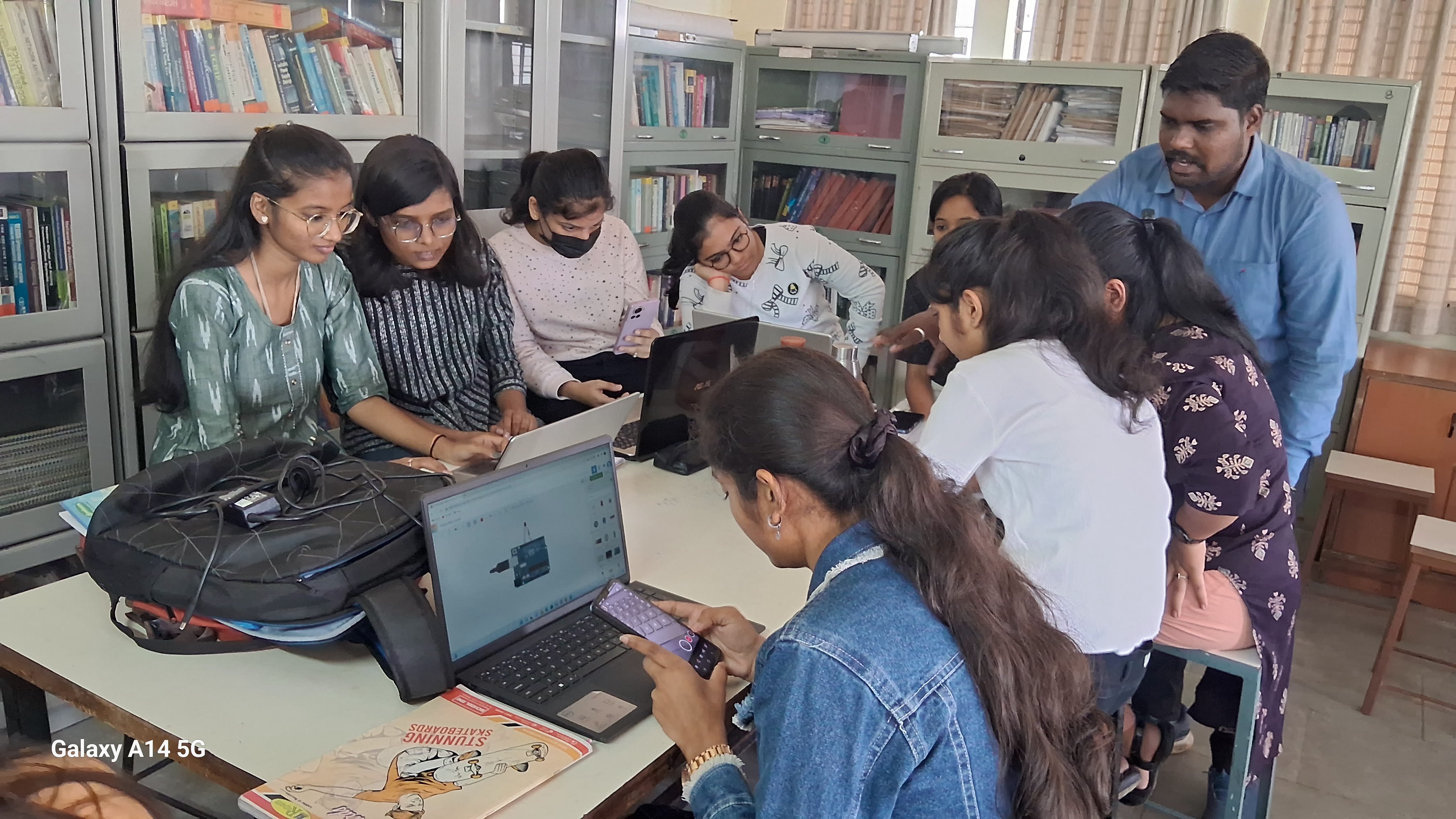 Engineering students collaborating on Arduino and IoT projects during a practical workshop at Sinhgad College of Engineering